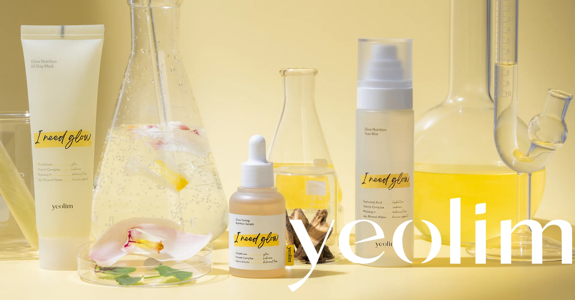 yeolim mist, serum and mask among lab glassware on a butter-yellow background